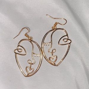 Face earrings